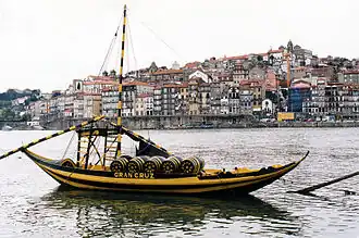 The typical rabelo boat and Porto historical district in background