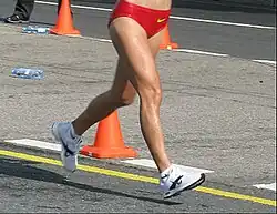 Image 6A racewalker "flying" (entirely out of contact with the ground, a rule violation) (from Race walking)