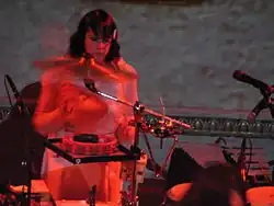 Rachel Blumberg playing drums for Bright Eyes
