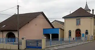 The town hall and school in Raynans