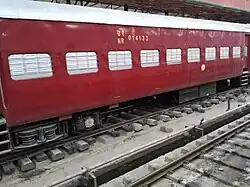 A red ICF coach used on an unnamed train