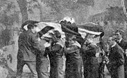 The coffin of Lieutenant Reginald Warneford being carried to his burial plot in Brompton Cemetery by members of the Royal Naval Division on June 21, 1915.