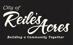 Official logo of Reile's Acres, North Dakota