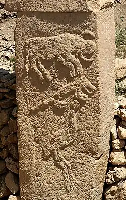 Low relief from the Pre-Pottery Neolithic archaeological site of Göbekli Tepe, believed to represent a bull, a fox, and a crane, c. 9,000 BC