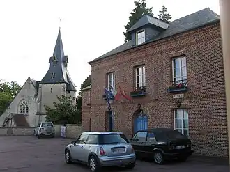 The church and town hall in Reux
