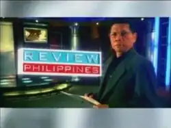 An image of Mike Enriquez. The show title is displayed on the left side of the image.