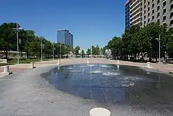 A plaza near Galatyn Park station in 2019