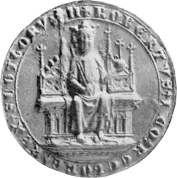 Black and white image of mediaeval seal depicting a king seated upon a throne