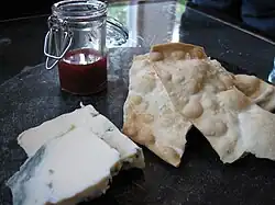 Raspberry-vanilla beer jam with flatbread and blue cheese