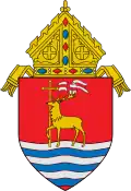 The arms of the Archdiocese of Hartford: The arms feature a hart, a male deer, in the midst of flowing water, i.e., fording a body of water, referencing the name of the see, Hartford, Connecticut.