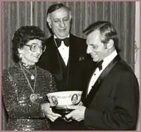 Green presenting a National Italian American Foundation award, c. 1987