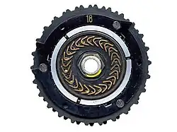 Bottom view of a NEMA rotor pair. Drive rotor "18." Note the three stepping-control cams.