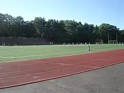 The running track, grand stand, and turf soccer field