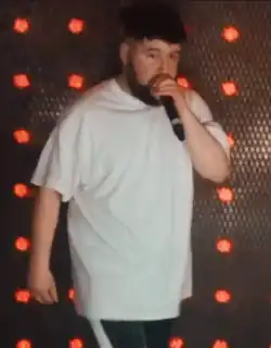 Gumbley performing in 2014