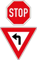 Stop for all directions, then they yield to left