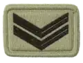 Corporal embossed badge