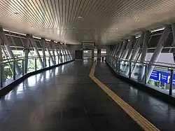 Pedestrian link heading towards 1Powerhouse from Entrance A of the station.