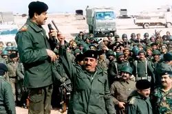 Saddam addresses Iraqi soldiers in April 1990