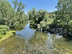 Tundzha River as seen from Saraçhane Bridge, built by Hadım Şehabeddin Pasha in Edirne, Turkey.