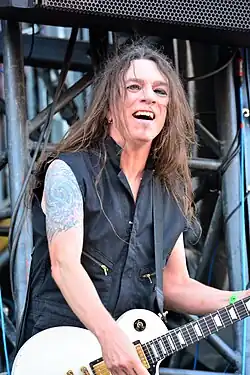 Hill performing with Skid Row at Wacken Open Air 2014