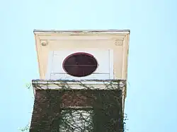 Where the once prominent church clock was once located.