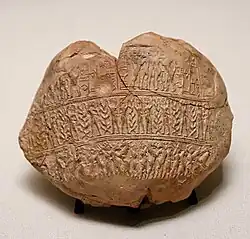 Seal of Barnamtarra, wife of Lugalanda. Clay seal impression.