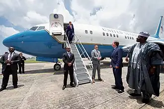 Secretary Kerry deplanes his flight at Nnamdi Azikiwe International Airport in Abuja