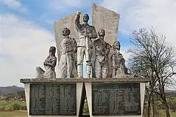 Monument to the victims of the First and Second World War, destroyed by the Chinese road building company in 2023[1]
