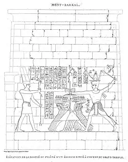 Senkamanisken slaying enemies in front of God Amun, at Jebel Barkal (pylon of building B 700, west of the main temple).[5]
