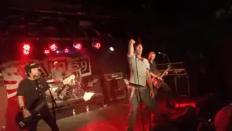 Sham 69 performing in 2018