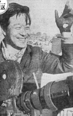 A black-and-white photo of Shin Sang-ok