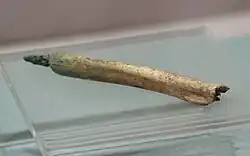 Bronze awl with bone handle.Probably derived from the Seima-Turbino culture.[9]