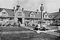 The quadrangle at Sidney Hill Cottage Homes looking towards the central archway and sundial