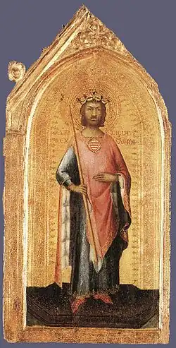A bearded middle-aged man wearing a crown