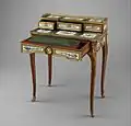 Small writing desk (bonheur-du-jour) by Martin Carlin at the Met Museum, drawers open, circa 1774