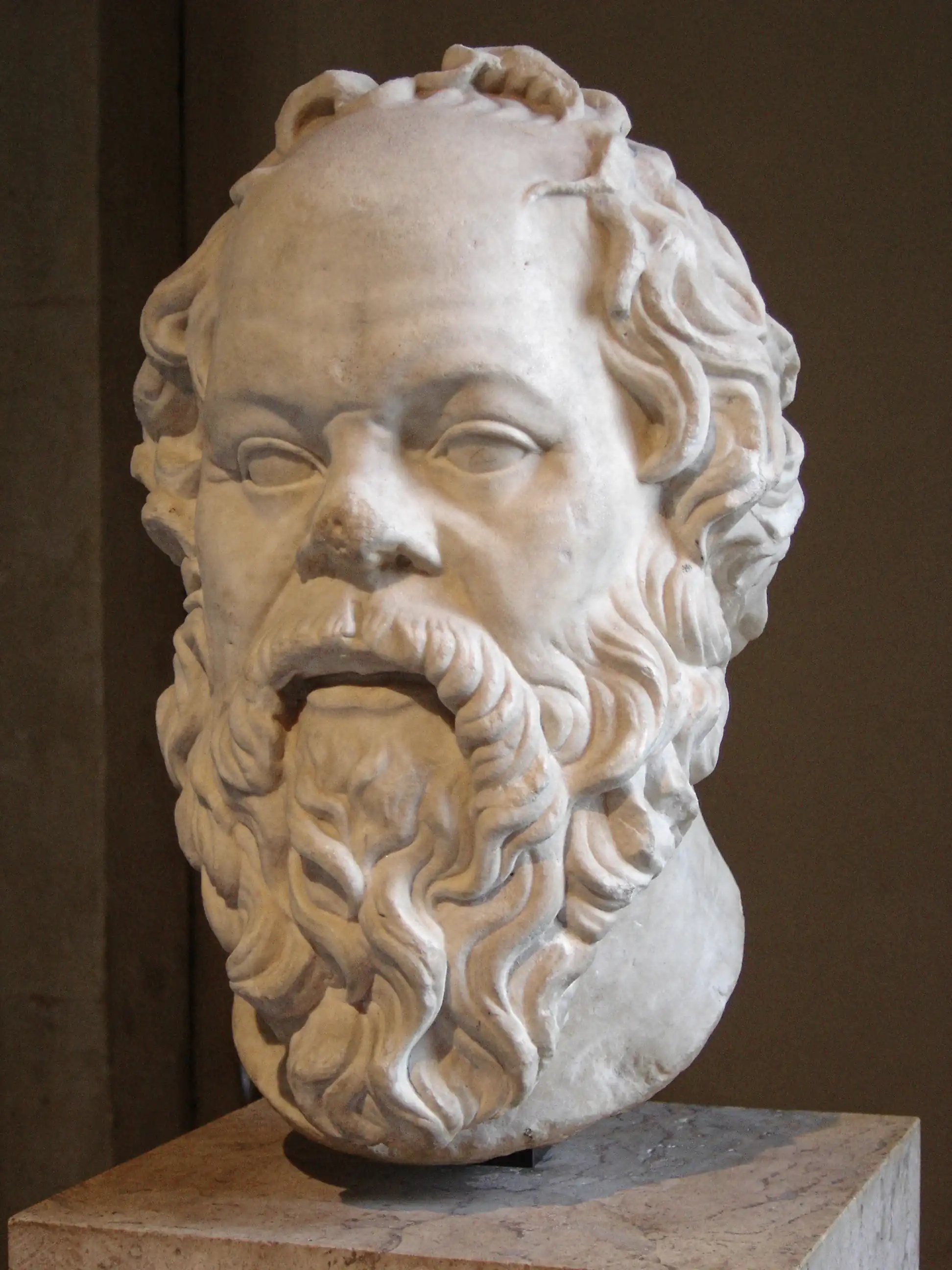 Photo of a marble bust of a bearded man