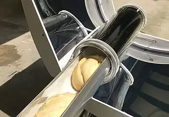 Solar oven glass tube cooking bread