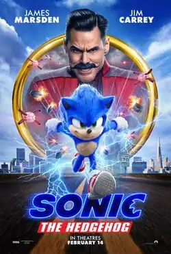 The titular Sonic the Hedgehog runs on a road pursued by drones and missles, atop a background of a cityscape and a ring with Dr. Robotnik inside it.