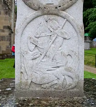 St George, detail of South Harting war memorial, West Sussex