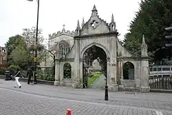 South gateway to churchyard of St Nicholas' Church adjoining Bartholomew Street
