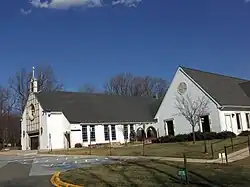 The Church and to the right, the building which contains the Chapel and Parish offices