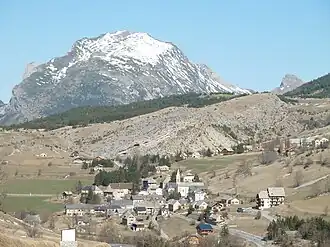 The village of Saint-Étienne-en-Dévoluy, with the south face of Le Gicon in the background
