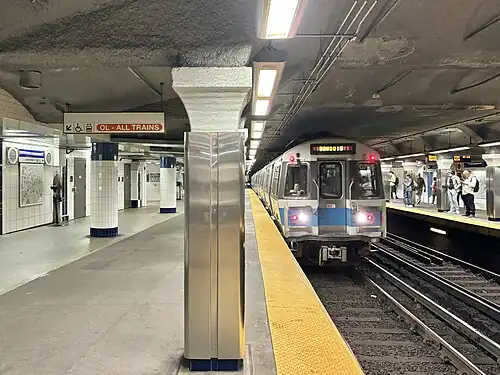 A metro train at an underground station