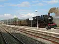 Steam locomotive arriving at Asciano.