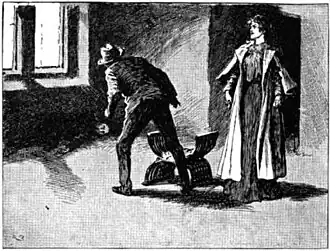 Beneath the window lay a dark, huddled heap