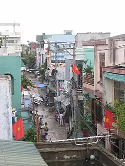 A street adorned with Vietnamese flags