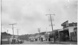 A black and white photo of a street in a street in Johnsonville in 1943