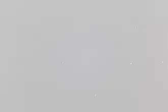 Original shot: lower edge Alkaid, right of center the double star Mizar with Alcor and right edge Alioth; the Pinwheel Galaxy is a small diffuse dot in the center of the image.