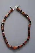 String of beads; 3300–3100 BC; carnelian, garnet, quartz and glazed steatite; length: 20.5 centimetres (8.1&nbsp;in); by Naqada III culture Metropolitan Museum of Art