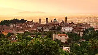 Bird's eye view of Bergamo's entire Città Alta (upper city), with the lower city in the background